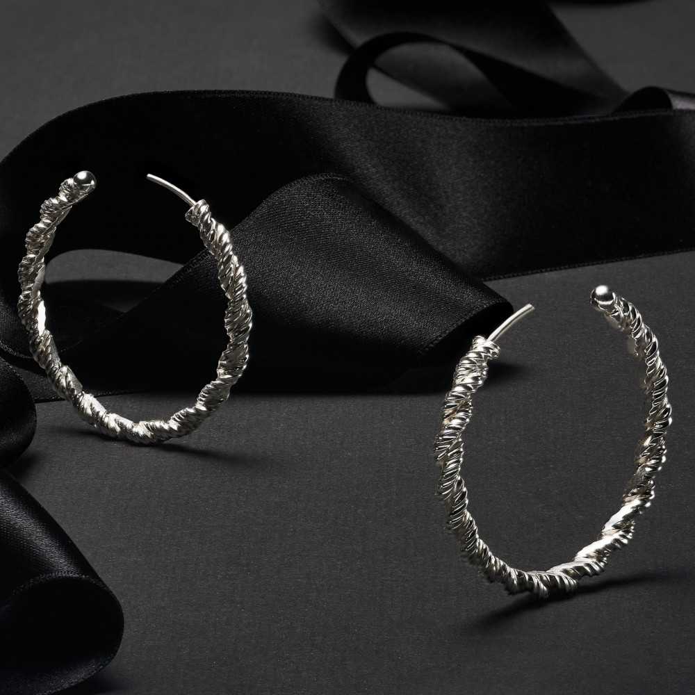 Boucles d'oreilles torsadée pour femme, bijoux artisanales en argent 925, crées à la main en Suisse à Yverdon