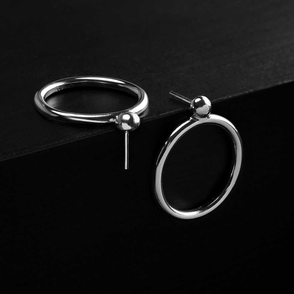 Puces d'oreilles en argent 925 pour femme, style minimaliste, création artisanale suisse, bijou de créateur Yverdon