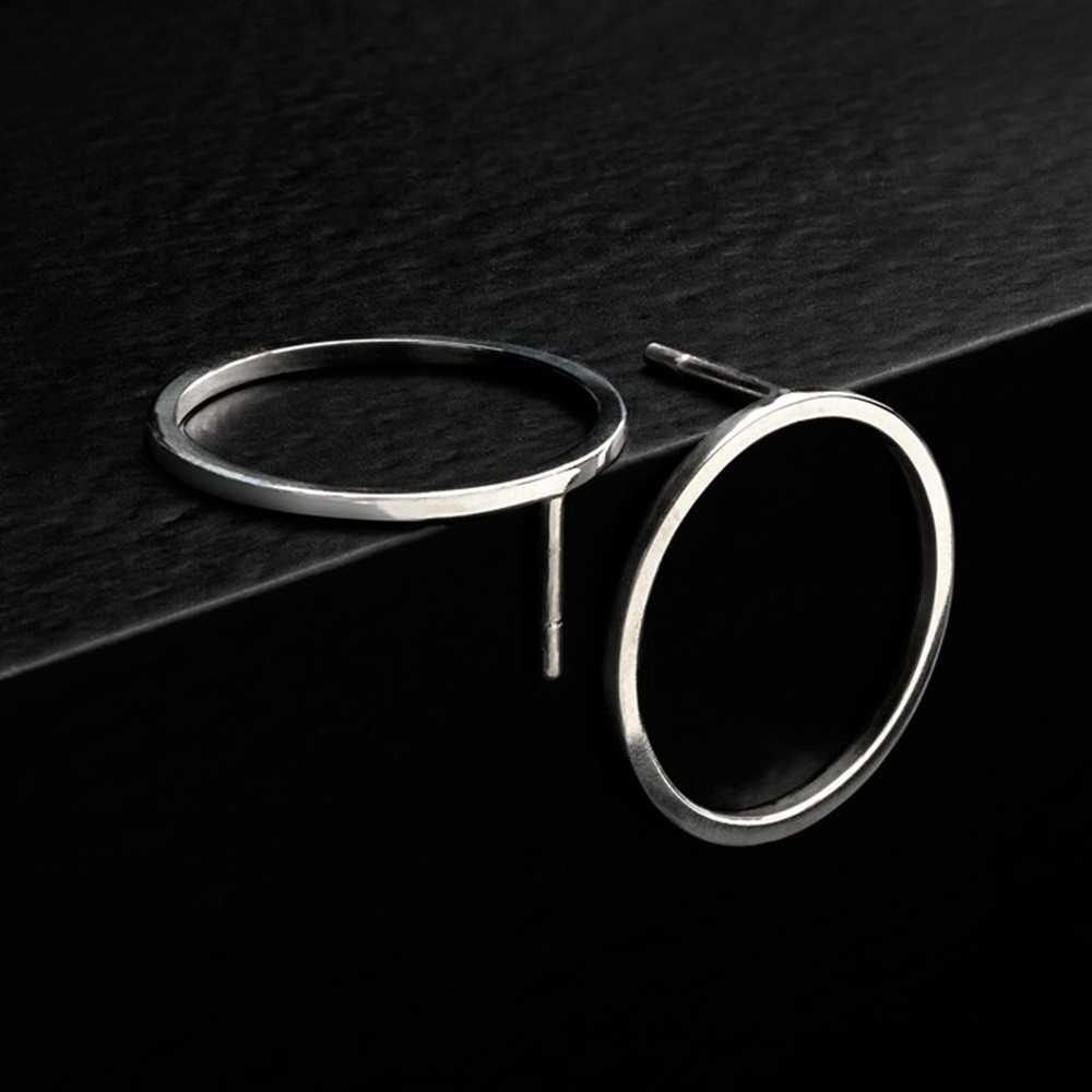 Boucles d'oreilles en argent 925 pour femme, bijoux minimalistes, collection circle, fabrication artisanale suisse, Yverdon