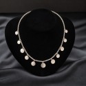 Collier pampilles organique en argent 925 de la collection Aphaïa créée par Alissia Müller Bijoux à Yverdon en Suisse romande.