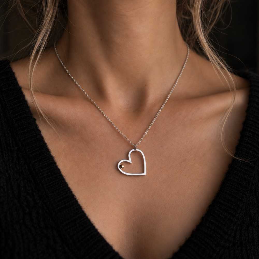 Collier coeur artisanal, argent et or, pendentif unique pour femme, cadeau bijou saint valentin Suisse romande